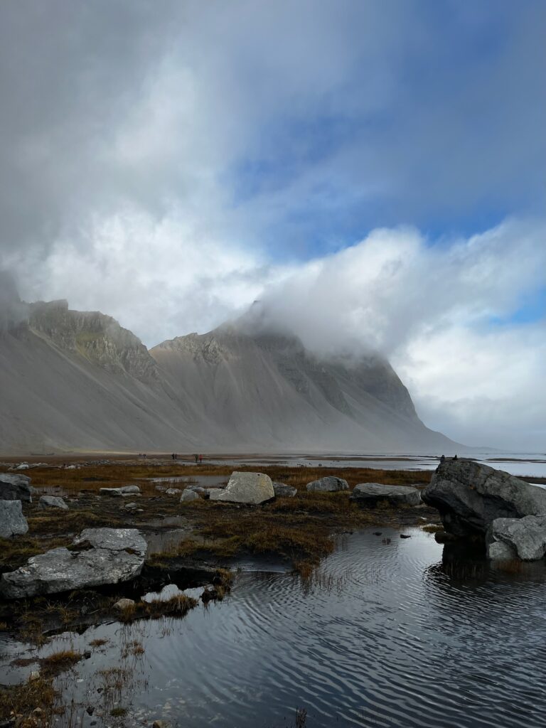 A large cloud blowing through Vestrahorn mountain