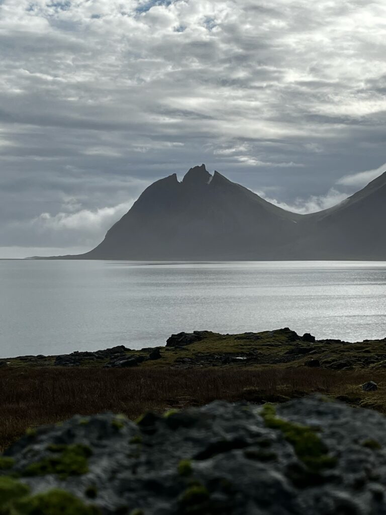 Vestrahorn mountain from the distance on a partly cloudy day