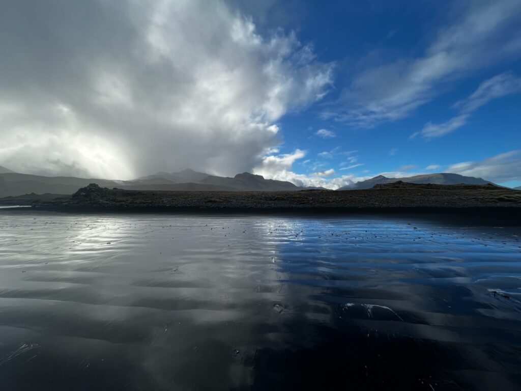 A split in the clouds on the east coast of Iceland