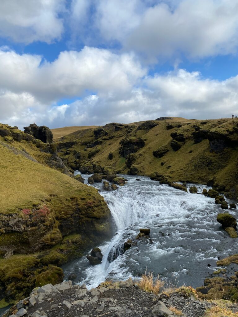 A hike on a sunny afternoon atop of Skógafoss